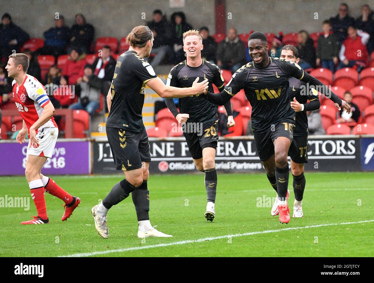 Charlton Athletic's Jonathan Leko (right) celebrates scoring their side's first goal of the game during the Sky Bet League One match at Highbury Stadium, Fleetwood. Picture date: Saturday October 2, 2021. Stock Photo
