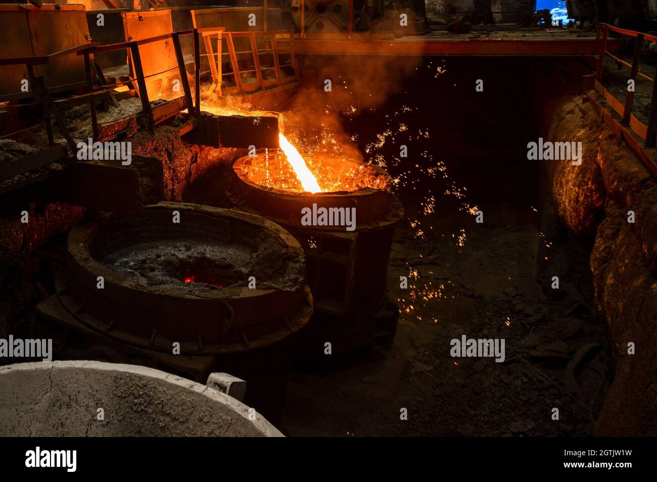 Special metallurgical ladles. The process of pouring molten metal Stock Photo