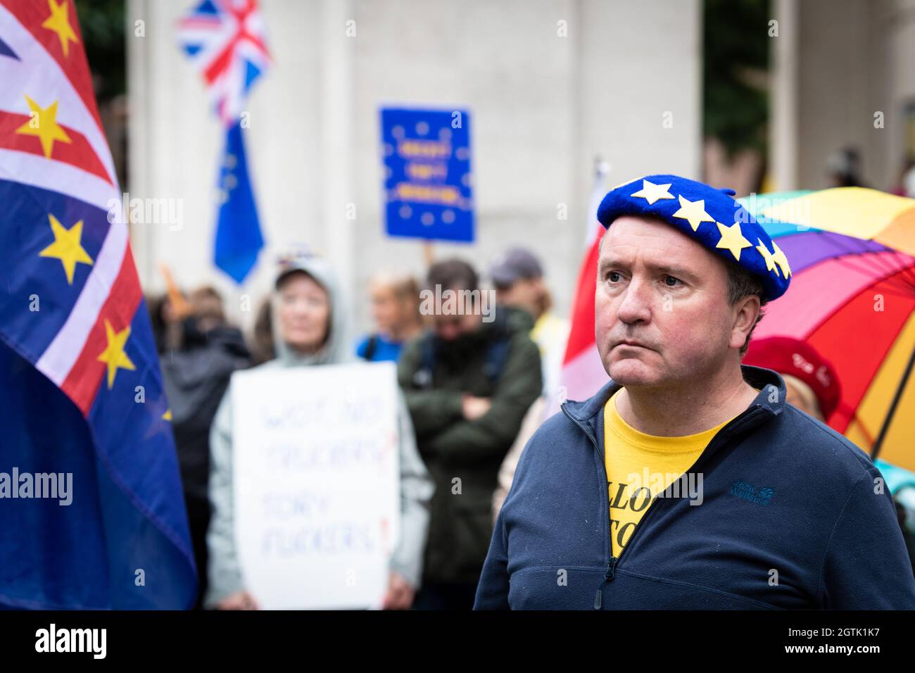 Manchester, UK. 02nd Oct, 2021. A man with a European Union coloured beret attends a Stop Brexit demonstration outside the Conservative Party Conference. People who oppose the deal gather in St Peters Square to demand a better deal with Europe. The key demands include returning to a single market and scraping the policing bill. Credit: Andy Barton/Alamy Live News Stock Photo