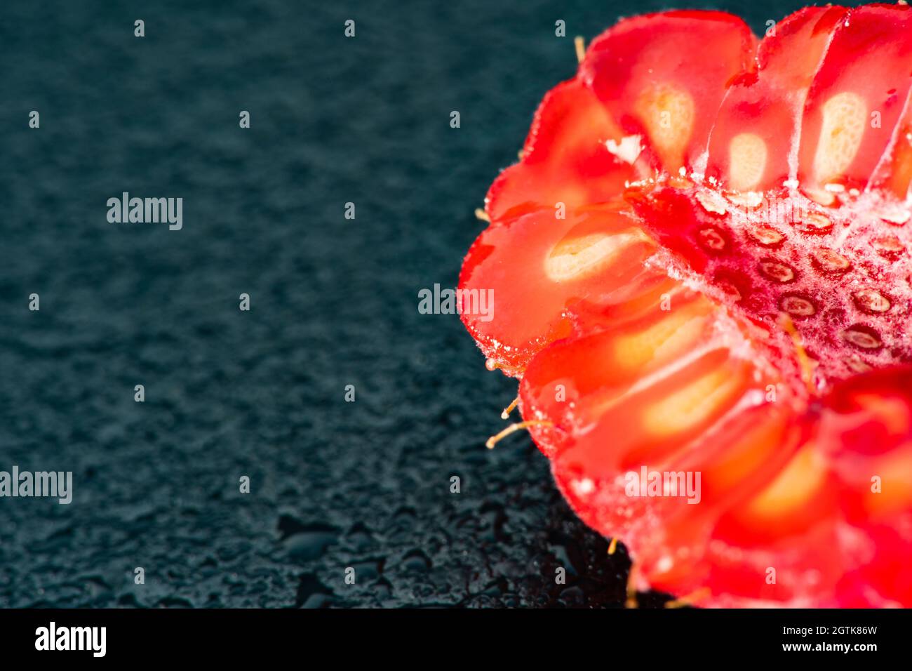 Macro Fruit: Ripe raspberry extreme close-up, black background ...