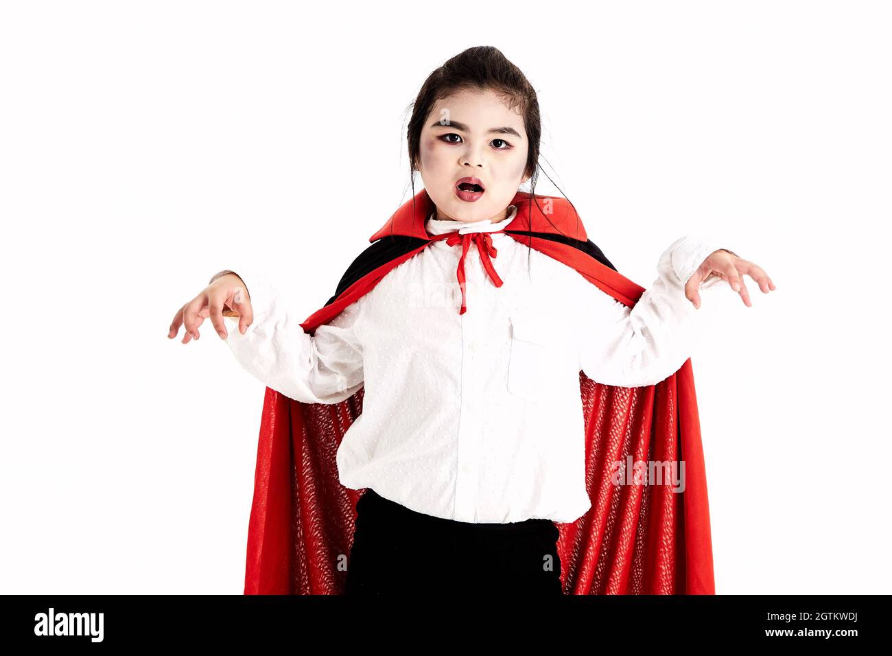 Wearing vampire cape hi-res stock photography and images - Alamy