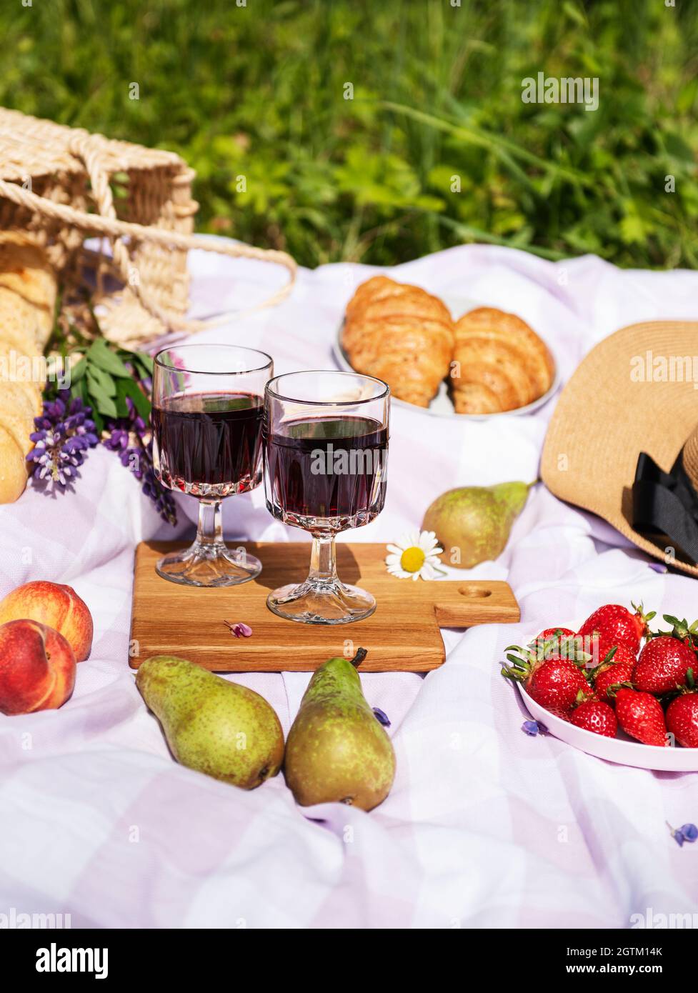 Romantic Picnic Scene On Summer Day. Outdoor Picnic With Wine And A Fruit Stock Photo Alamy
