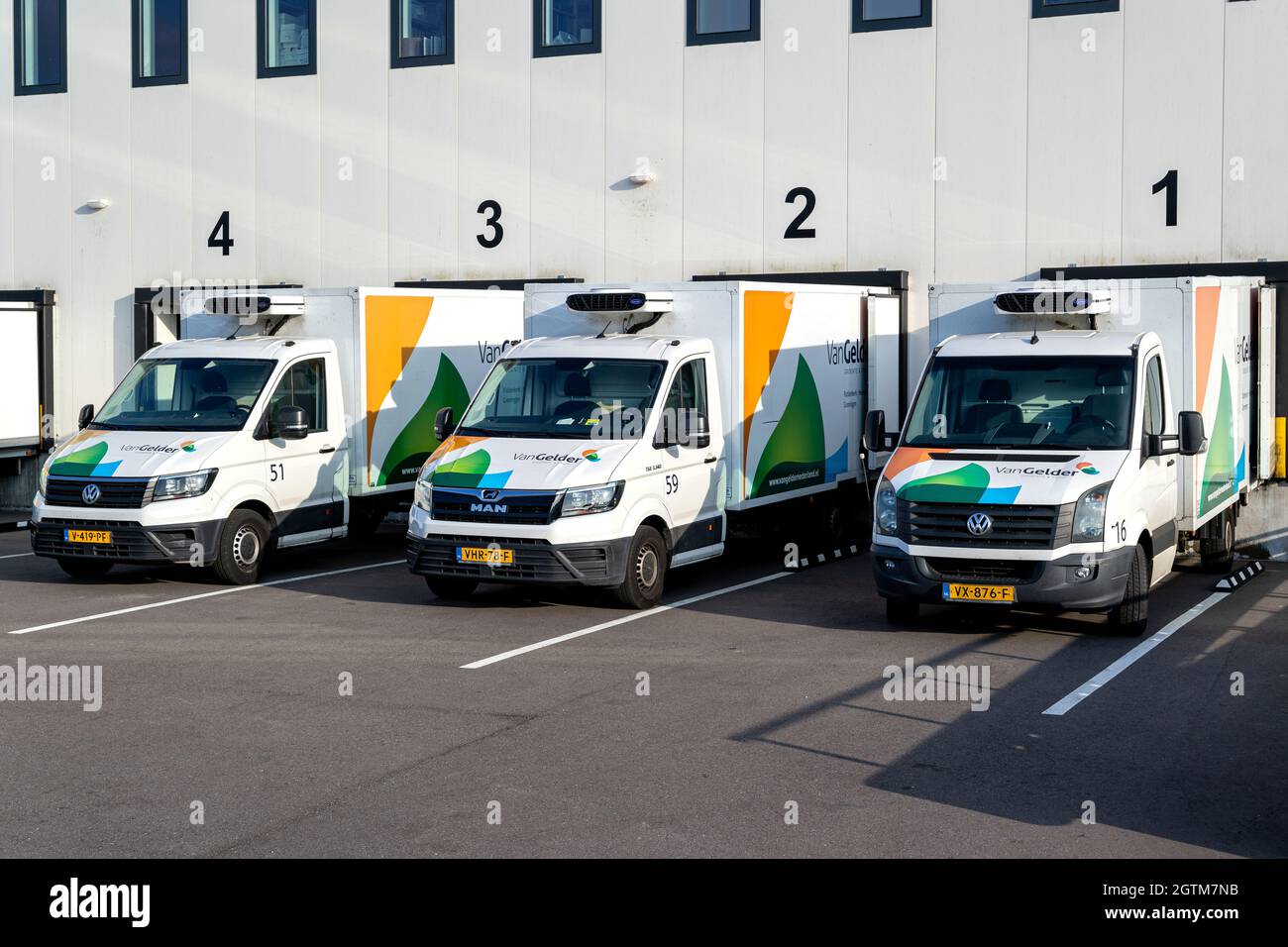 Van Gelder delivery vans at loading dock Stock Photo
