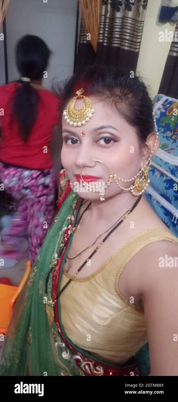 A Portrait Shot of Indian Married Woman in traditional dress during