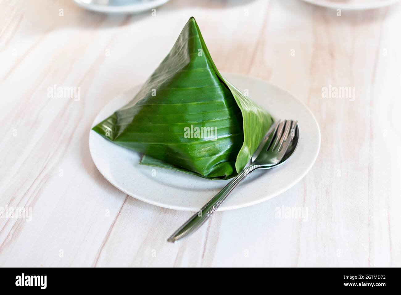 High Angle View Of Nasi Lemak In Plate On Table Stock Photo