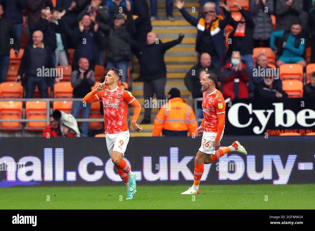 Blackpool's Jerry Yates (left) celebrates scoring his side's second goal of the game during the Sky Bet Championship match at Bloomfield Road, Blackpool. Picture date: Saturday October 2, 2021. Stock Photo