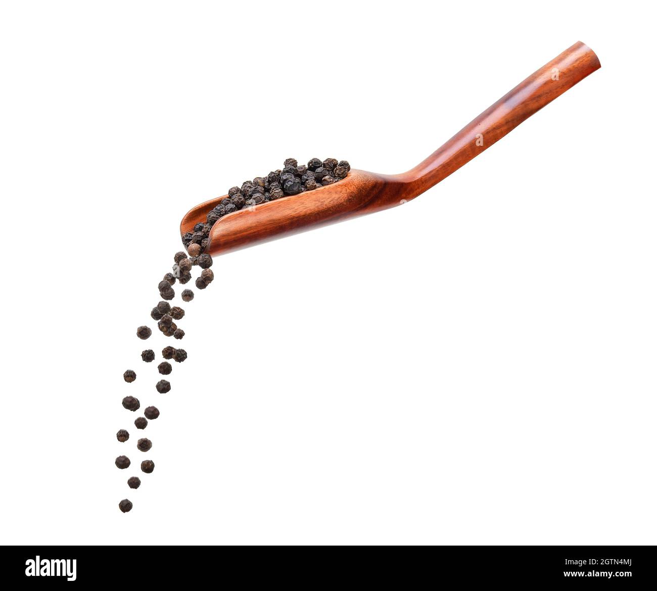 Black Peppercorns Spilling Against White Background Stock Photo Alamy