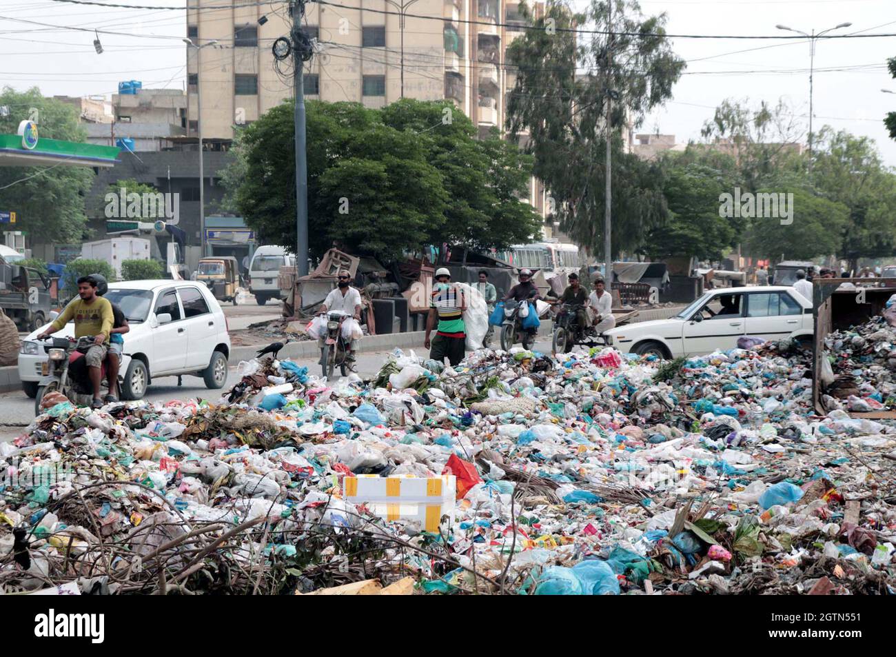 View of huge heap of garbage creating problems for commuters, residents and unhygienic atmosphere showing the negligence of concerned department, located on Jahangirabad area of Karachi on Saturday, October 02, 2021. (Rizwan Ali/PPI Images). Stock Photo