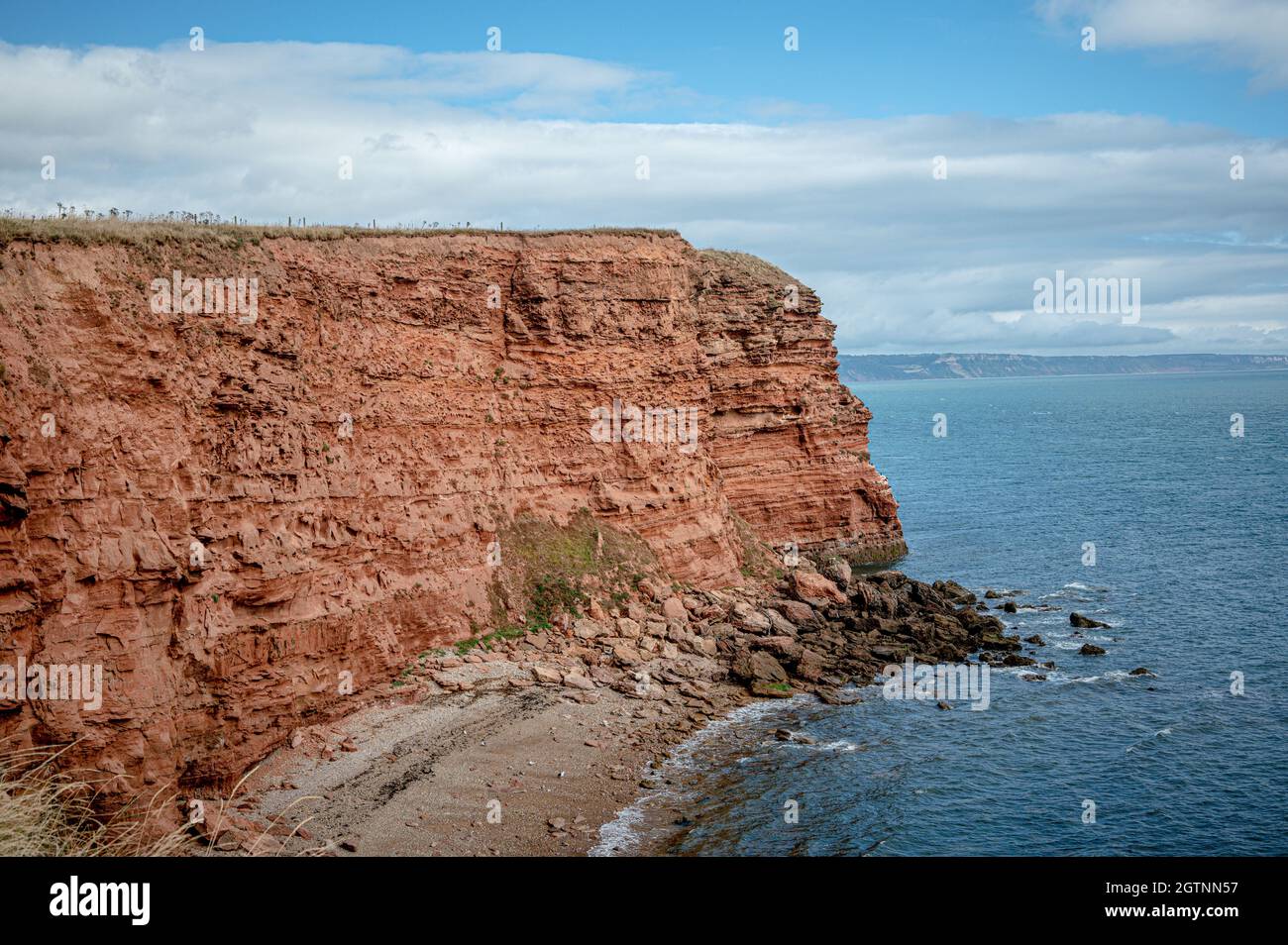 Red Otter Sandstone cliffs at Danger Point, walking east from Otterton ...