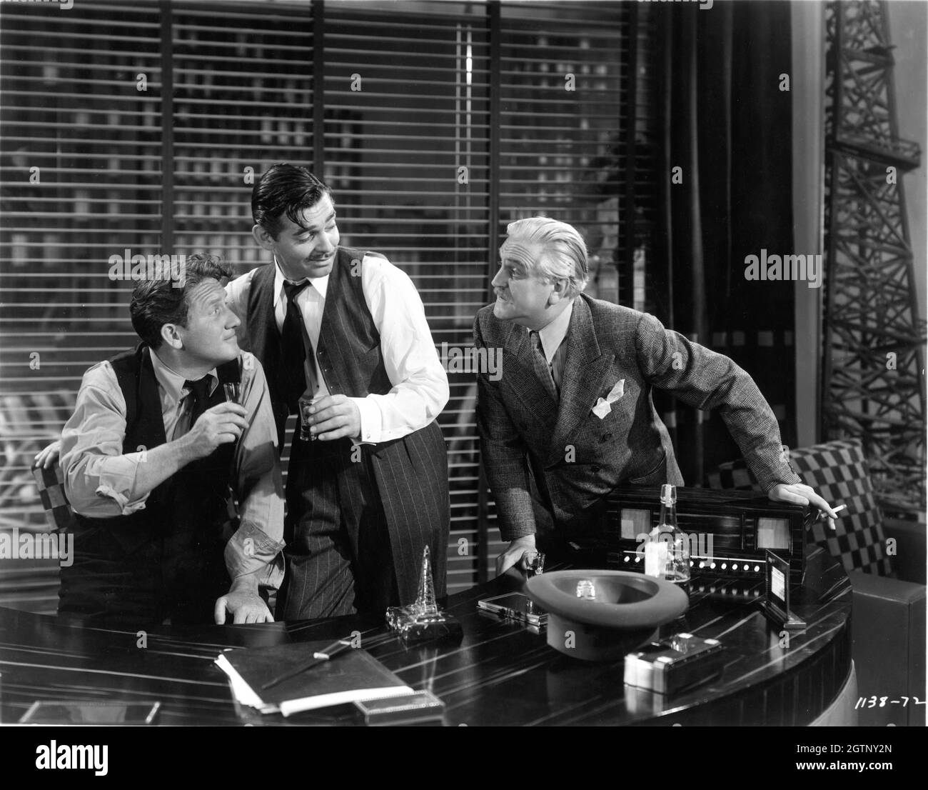 SPENCER TRACY CLARK GABLE and FRANK MORGAN in BOOM TOWN 1940 director JACK CONWAY screenplay John Lee Mahin based on a story by James Edward Grant gowns Gilbert Adrian music Franz Waxman Metro Goldwyn Mayer Stock Photo