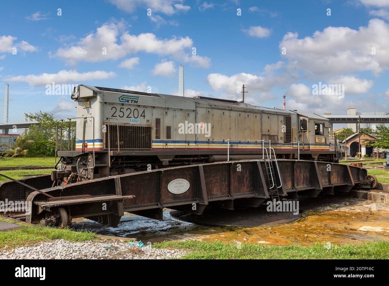 KTM 25 Class Locomotive 25204 Mutiara on a revolving turntable located in Penang Malaysia. Made in Carlisle UK in 1927 by Cowans Sheldon and Co Ltd. Stock Photo