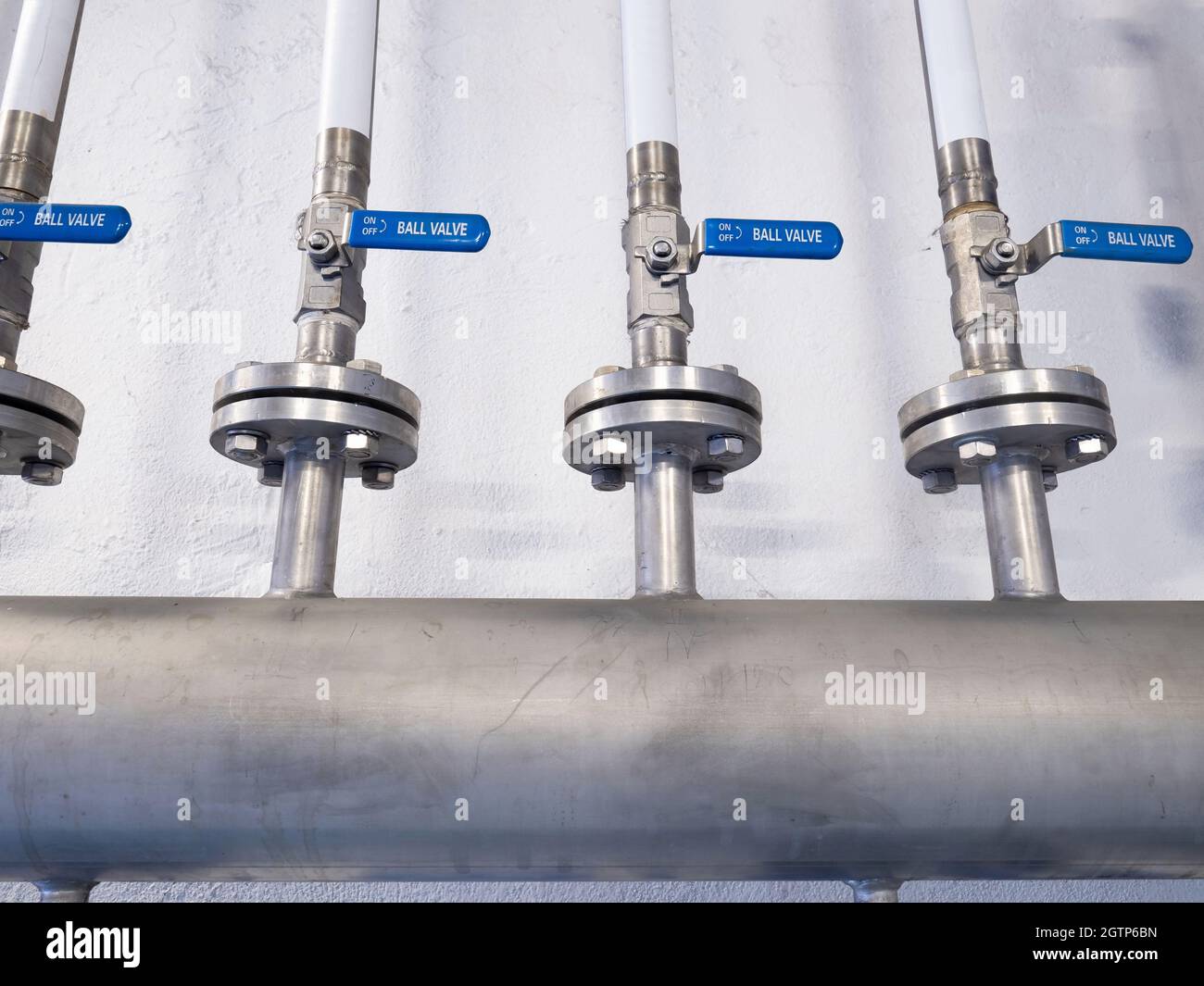 Metal Chrome Pipe With Flange And Set Of Valves. Industrial Concept Of