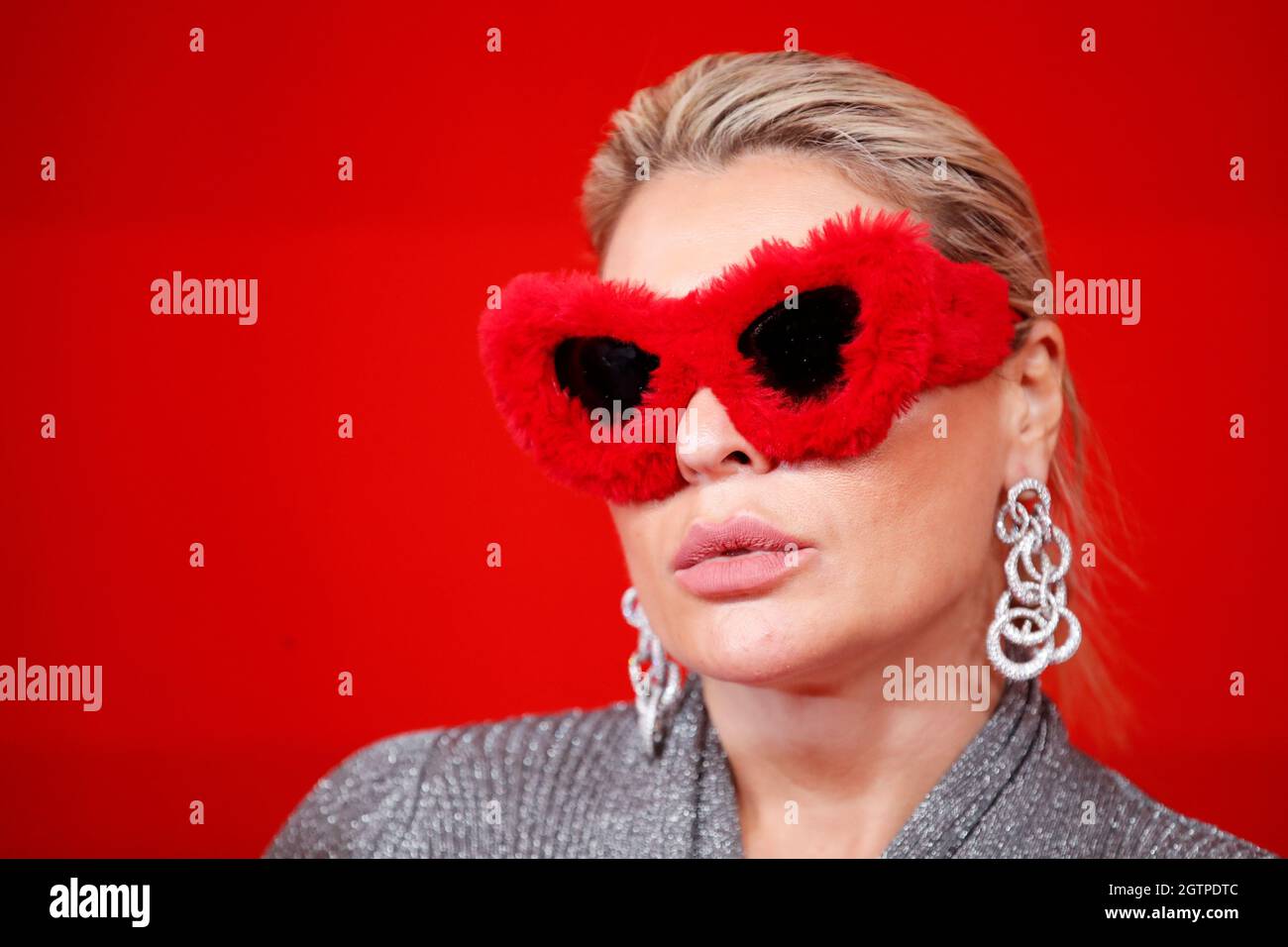 A guest poses at the Balenciaga Summer 2022 Red Carpet Event at Paris  Fashion Week in Paris, France, October 2, 2021. REUTERS/Gonzalo Fuentes  Stock Photo - Alamy