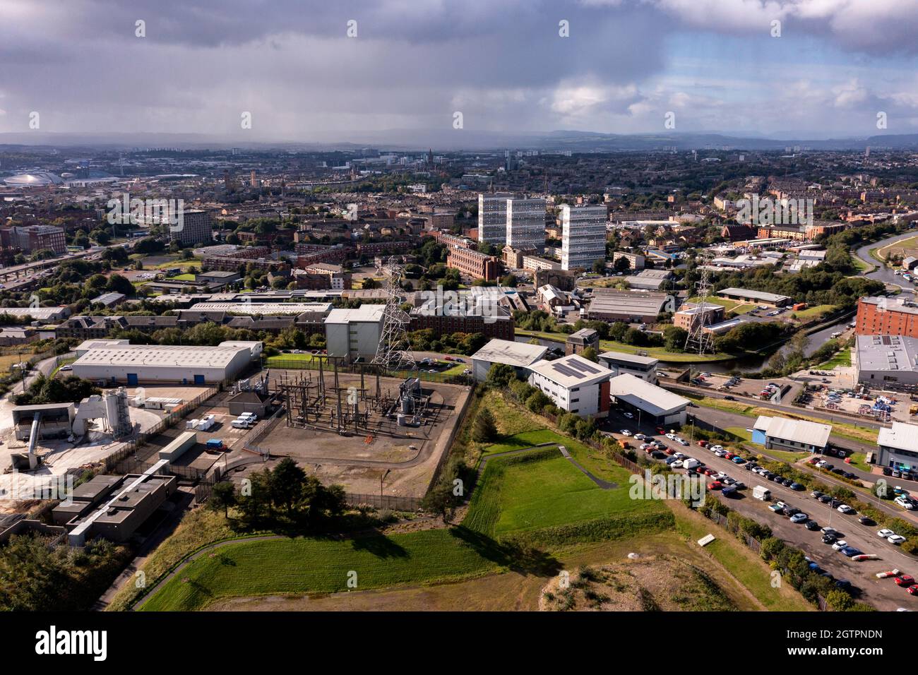 Glasgow, Scotland, UK. 29 September 2021 PICTURED: Looking over to the back  of Speirs Wharf and beyond with the high flats of Maryhill. Aerial drone  view of Glasgow's Sighthill area showing the