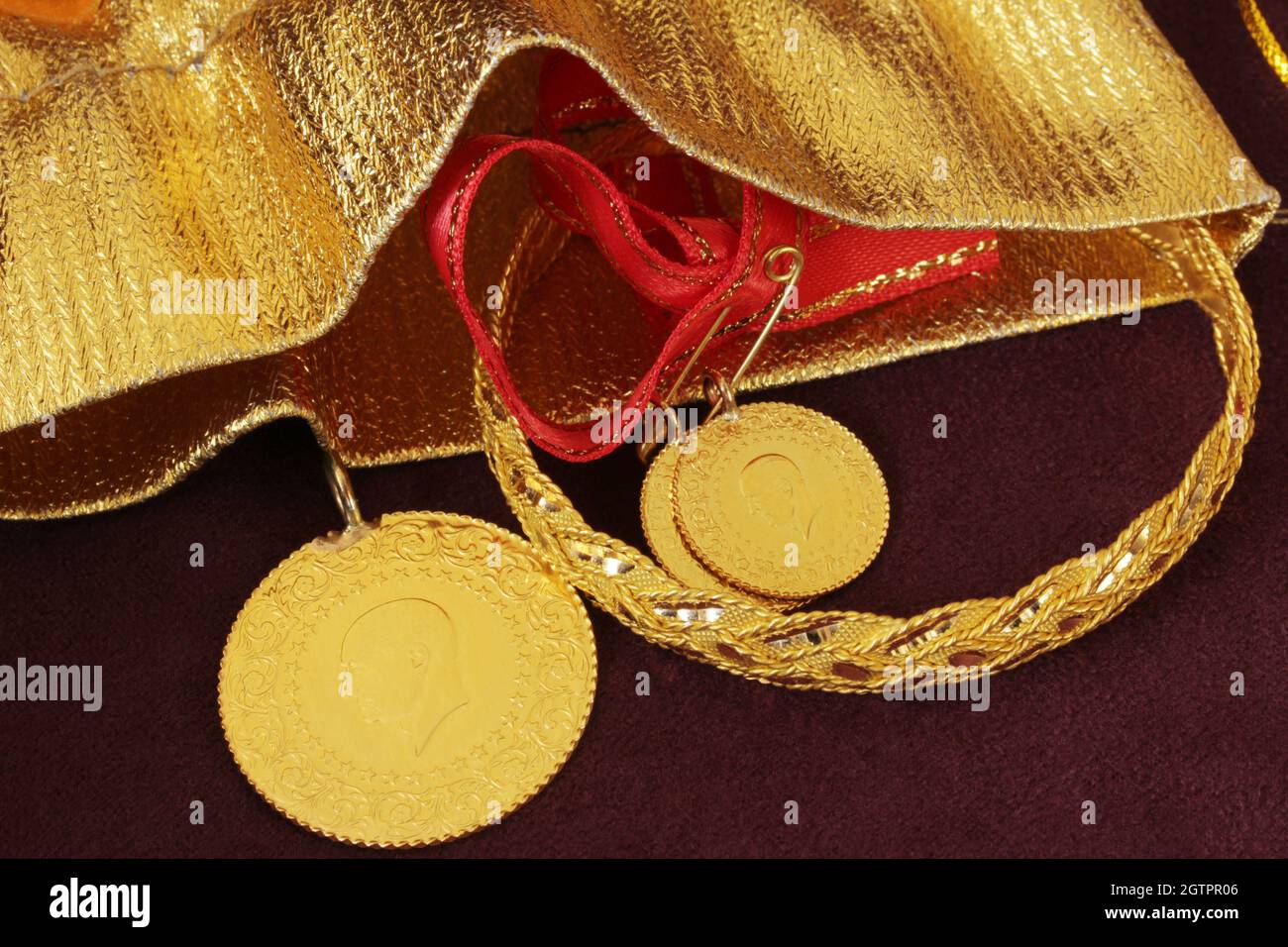 Turkish gold coin. Gold bracelet. Turkish Gold coin necklace Stock