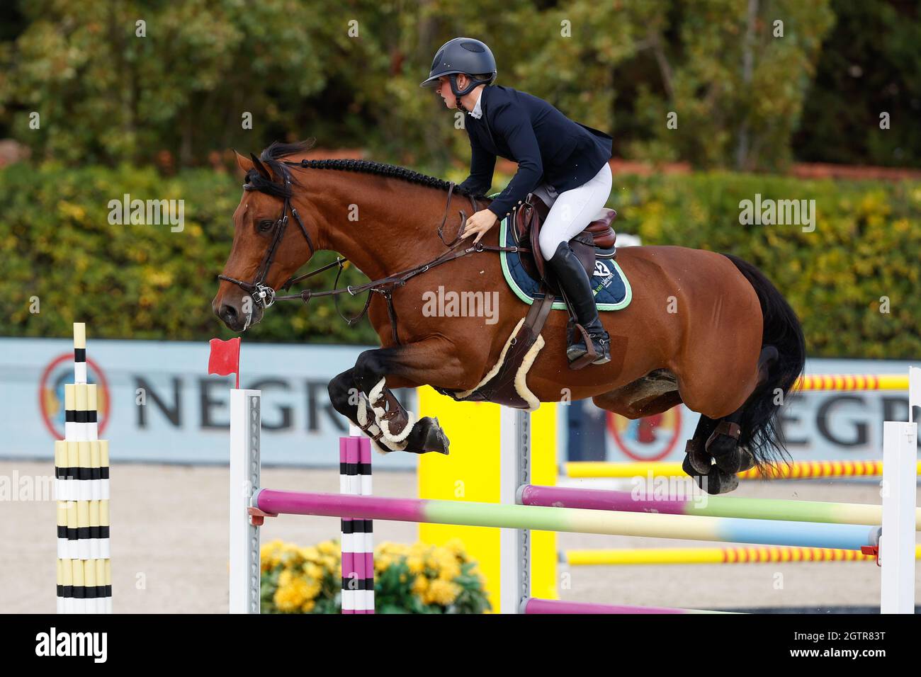Sanne Thijssen of Nederland riding Hi There during the CSIO Barcelona: Longines FEI jumping Nations Cup at Real Club de Polo of Barcelona. Stock Photo