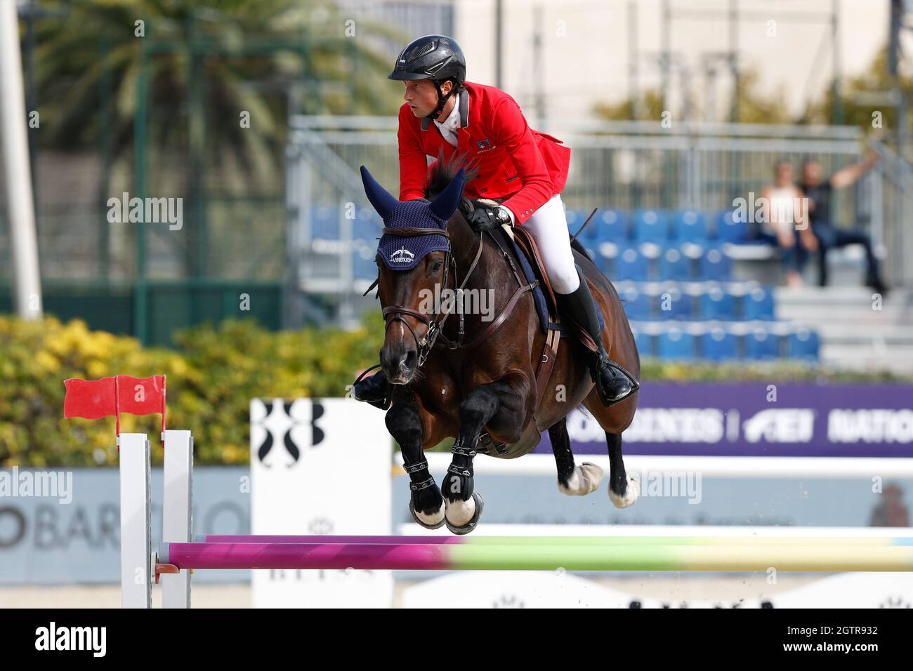 Martin Fuchs of Switzerland riding The Sinner during the CSIO Barcelona: Longines FEI jumping Nations Cup at Real Club de Polo of Barcelona. Stock Photo