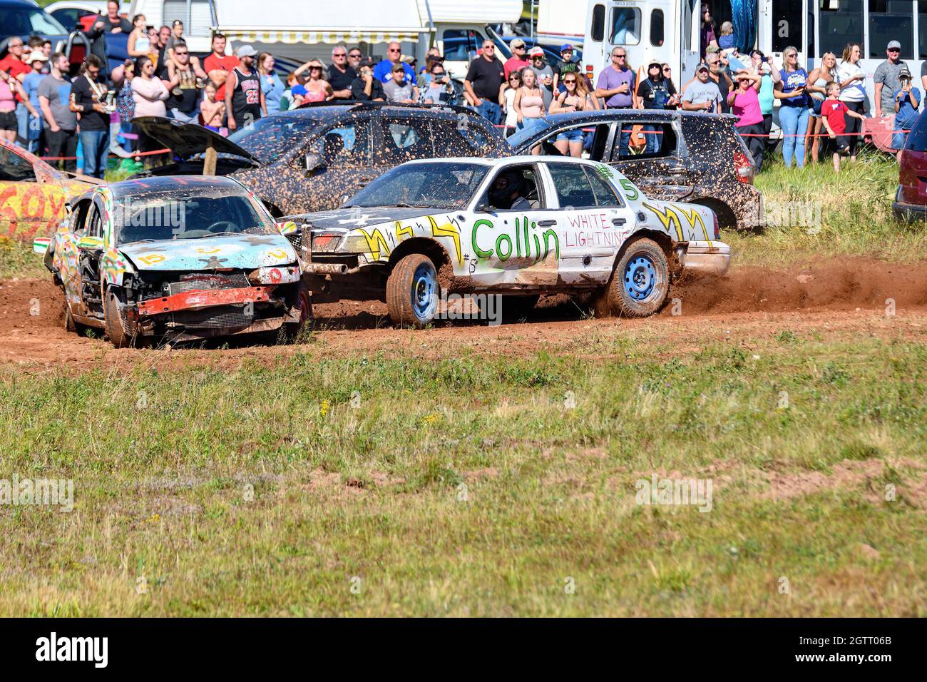 Norton, NB, Canada - September 11, 2021: Amateur demolition derby at the Redneck Raceway, in Norton NB. One car smashes into the side of another. Stock Photo