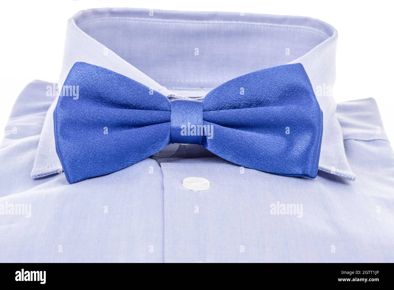closeup new and folded blue shirt and bow tie Stock Photo - Alamy
