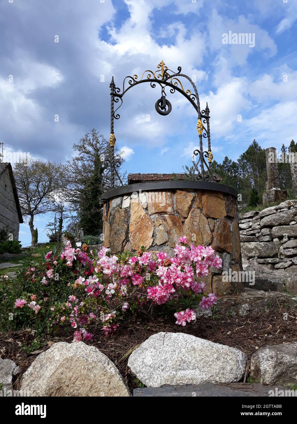 Rural stone water well hi-res stock photography and images - Alamy