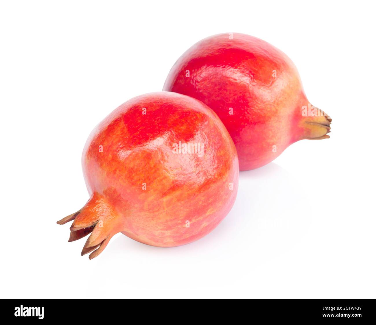 Close-up Of Pomegranates On White Background Stock Photo