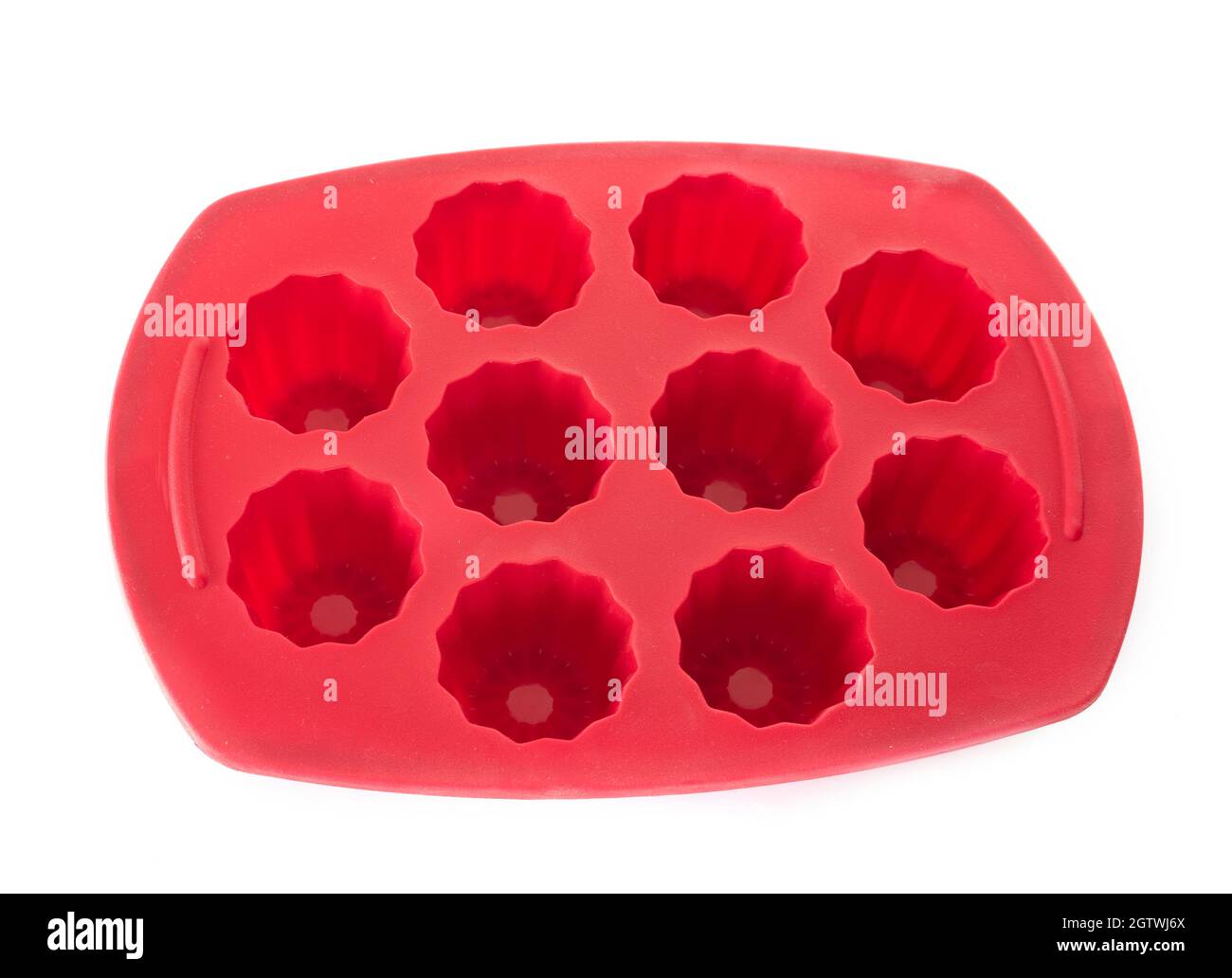 Red Muffin Tin Against White Background Stock Photo