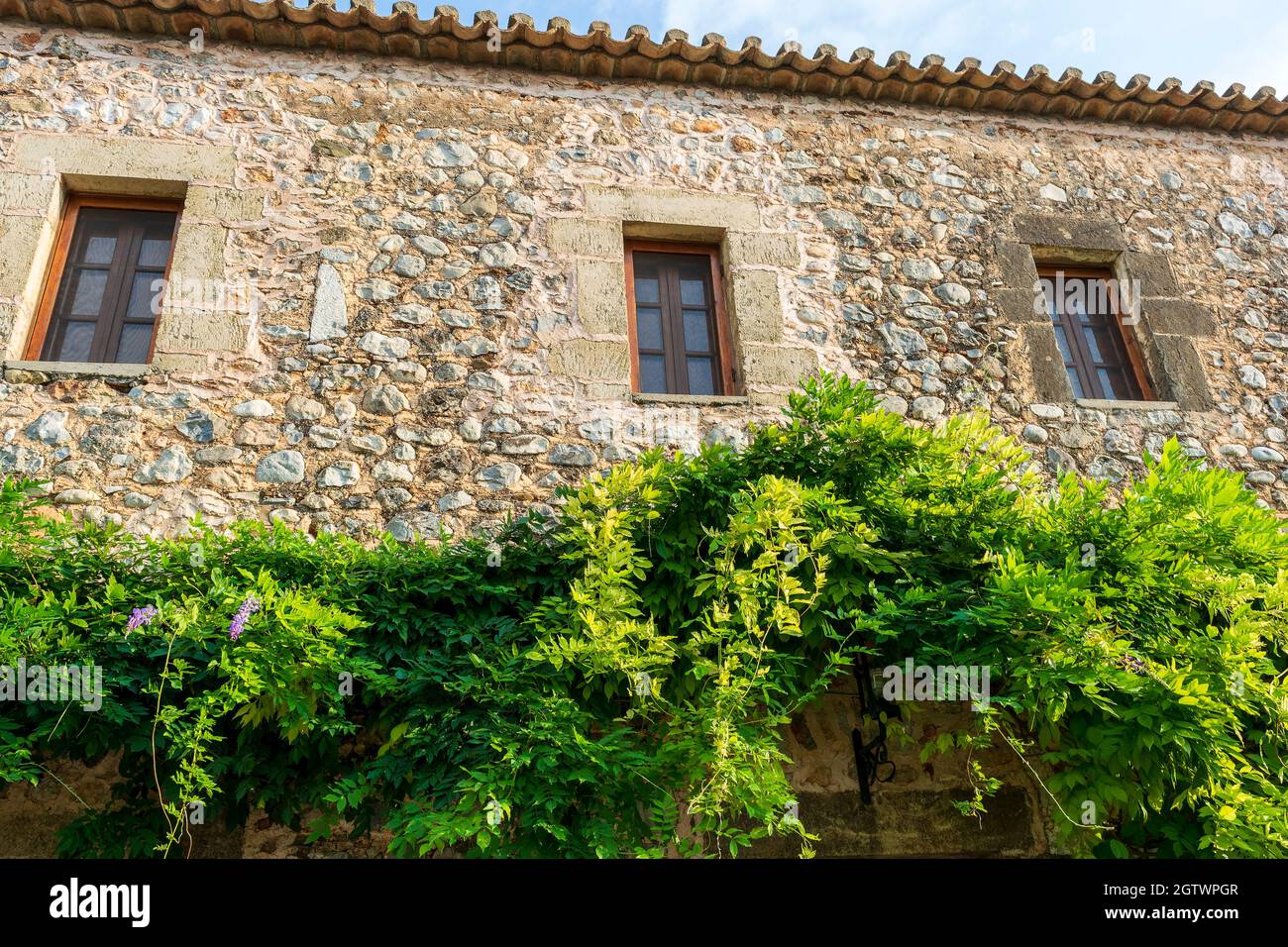 Building in the old town of Kardamyli in Messiniaki Mani region, south  Peloponnese at Greece Stock Photo - Alamy