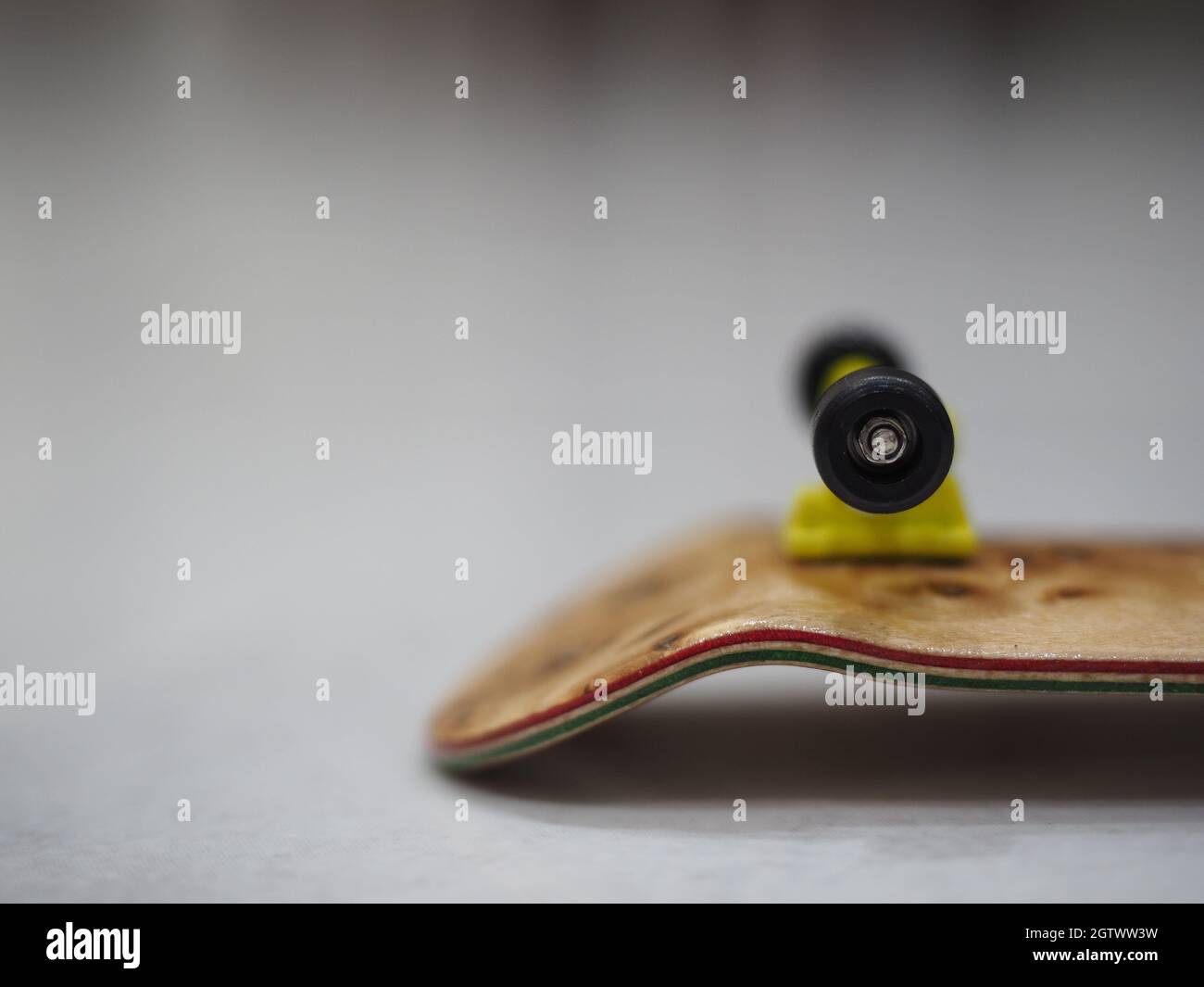 Finger Skateboard Close Up Details With Blur Background. Copy Space