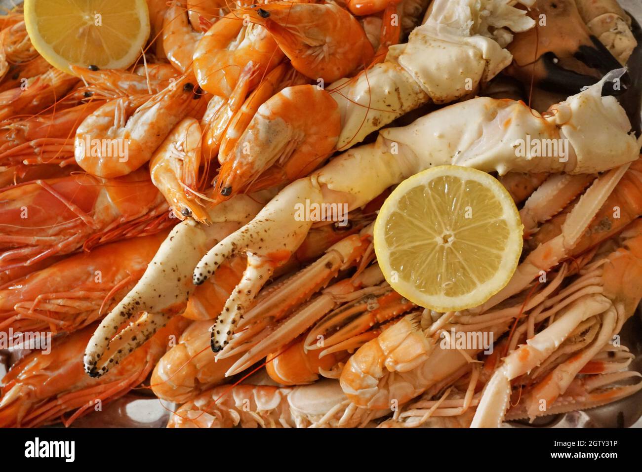 Full Frame Shot Of Seafood With Lemons Stock Photo
