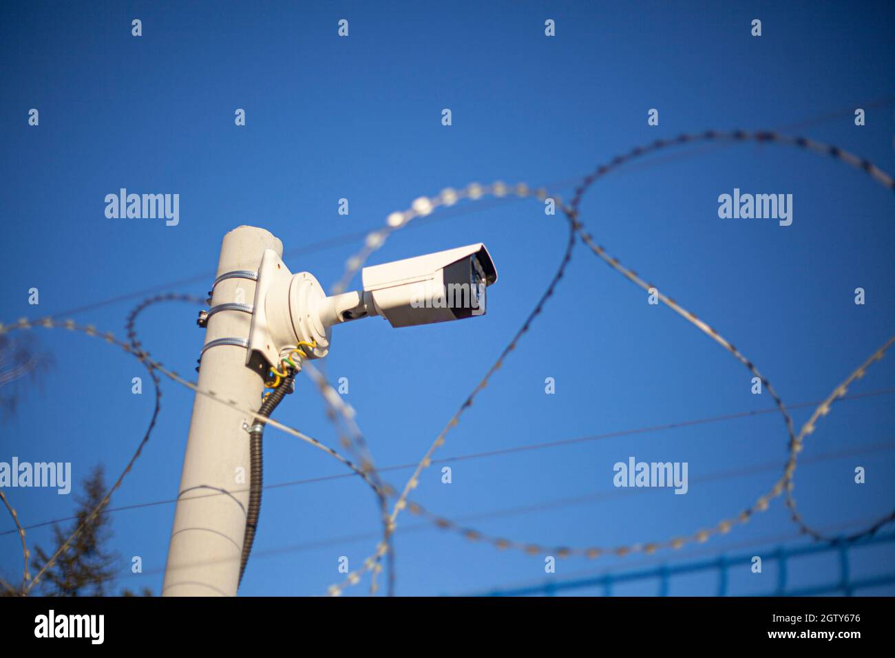 Camcorder On The Fence. Protected Area. Perimeter Security. Barbed Wire