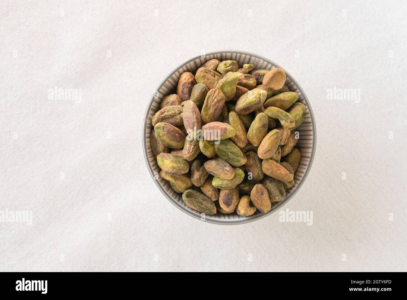 Toasted Salted Pistachios In A Bowl Stock Photo