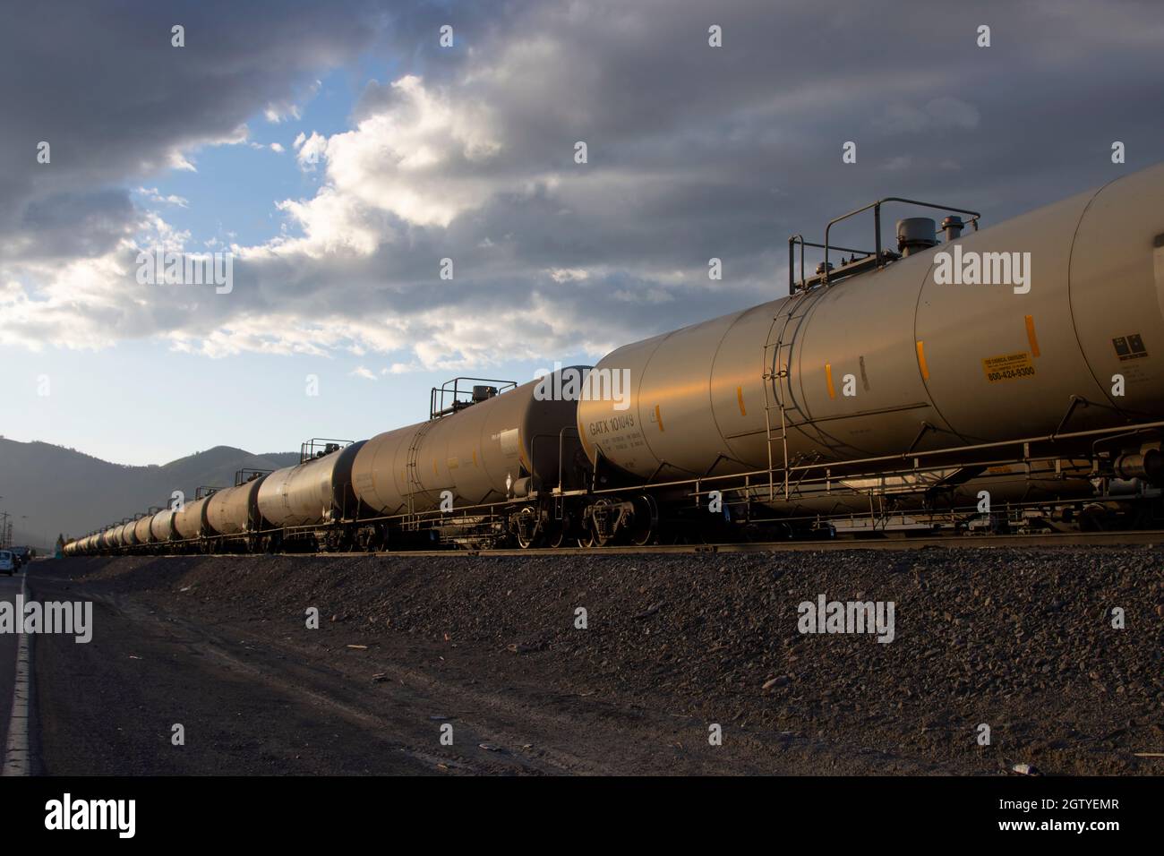 Railroad tank cars carrying hazardous materials on a siding in a train