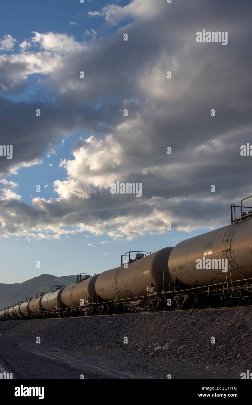 Railroad tank cars carrying hazardous materials on a siding in a train
