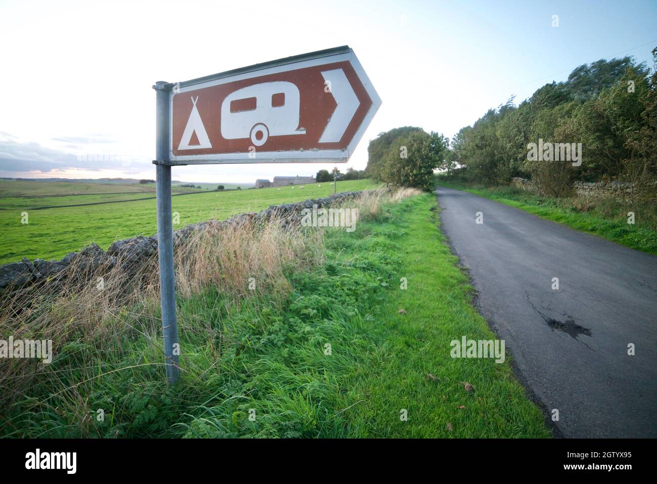 Caravan and Campsite Camping Brown Information Sign UK Pointing to a Caravan Park or Camp Site Stock Photo