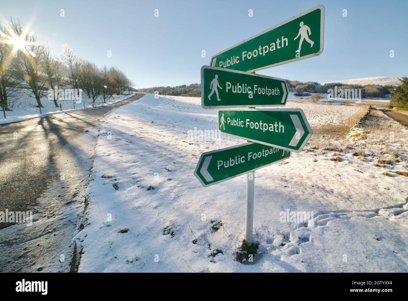 Multiple sign posts for public footpaths in England, public footpath sign, multiple paths, lots of paths, different options. Stock Photo
