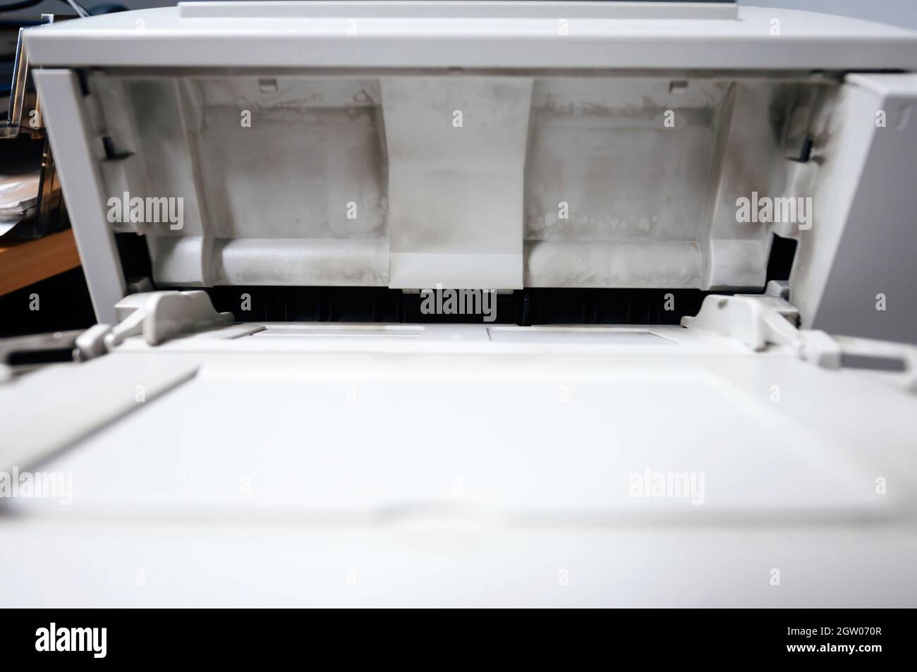 Dirty with printing dust from toner open paper tray on the vintage