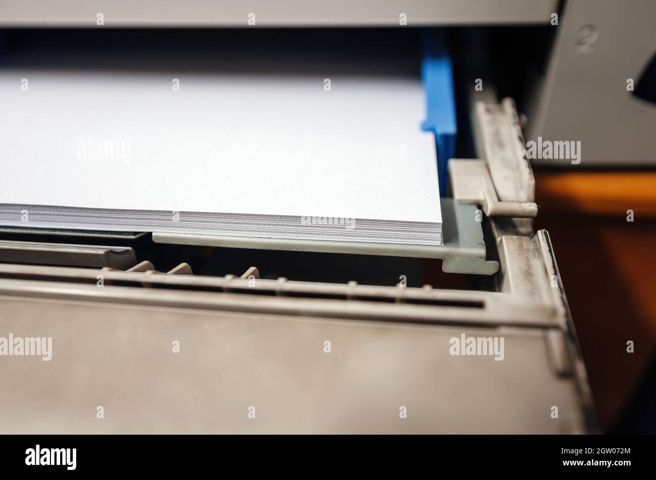 white paper in laser printer full with printing dust Stock Photo Alamy