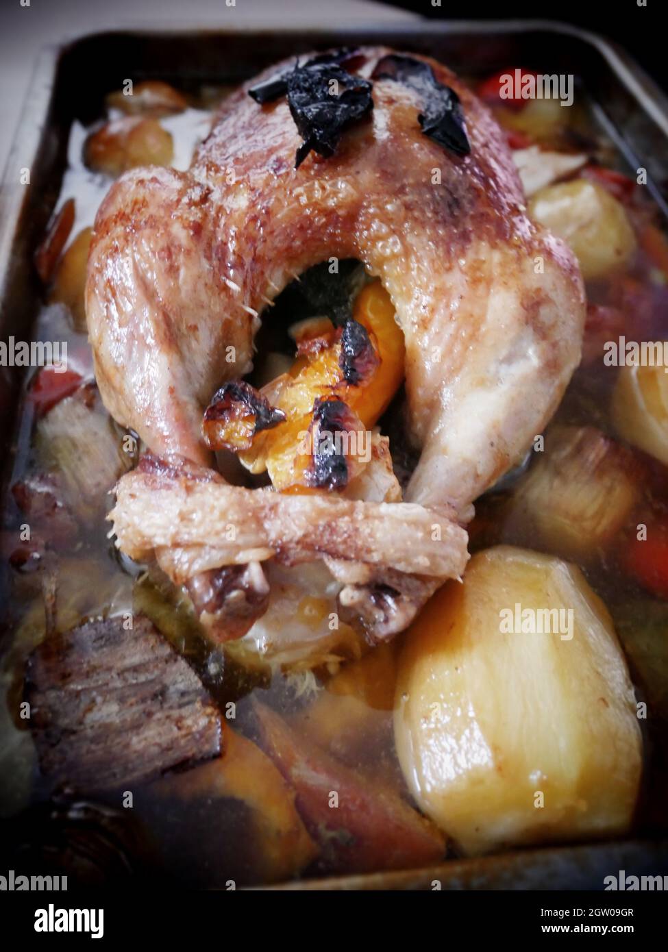 High Angle View Of Roasted Meat And Vegetables Served In Tray Stock Photo