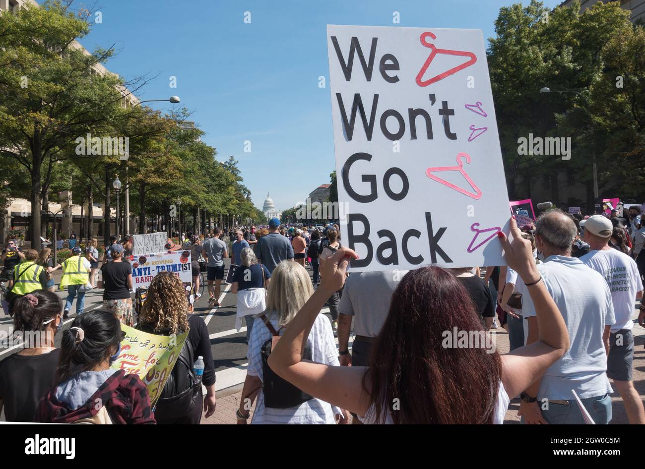 2021 Women's march in Washington DC, demanding continued access to abortion after the ban on most abortions in Texas, and the looming threat to Roe v Wade in the upcoming Supreme Court session. Thousands march from rally at Freedom Plaza to the US Supreme Court. Oct. 2, 2021. Stock Photo