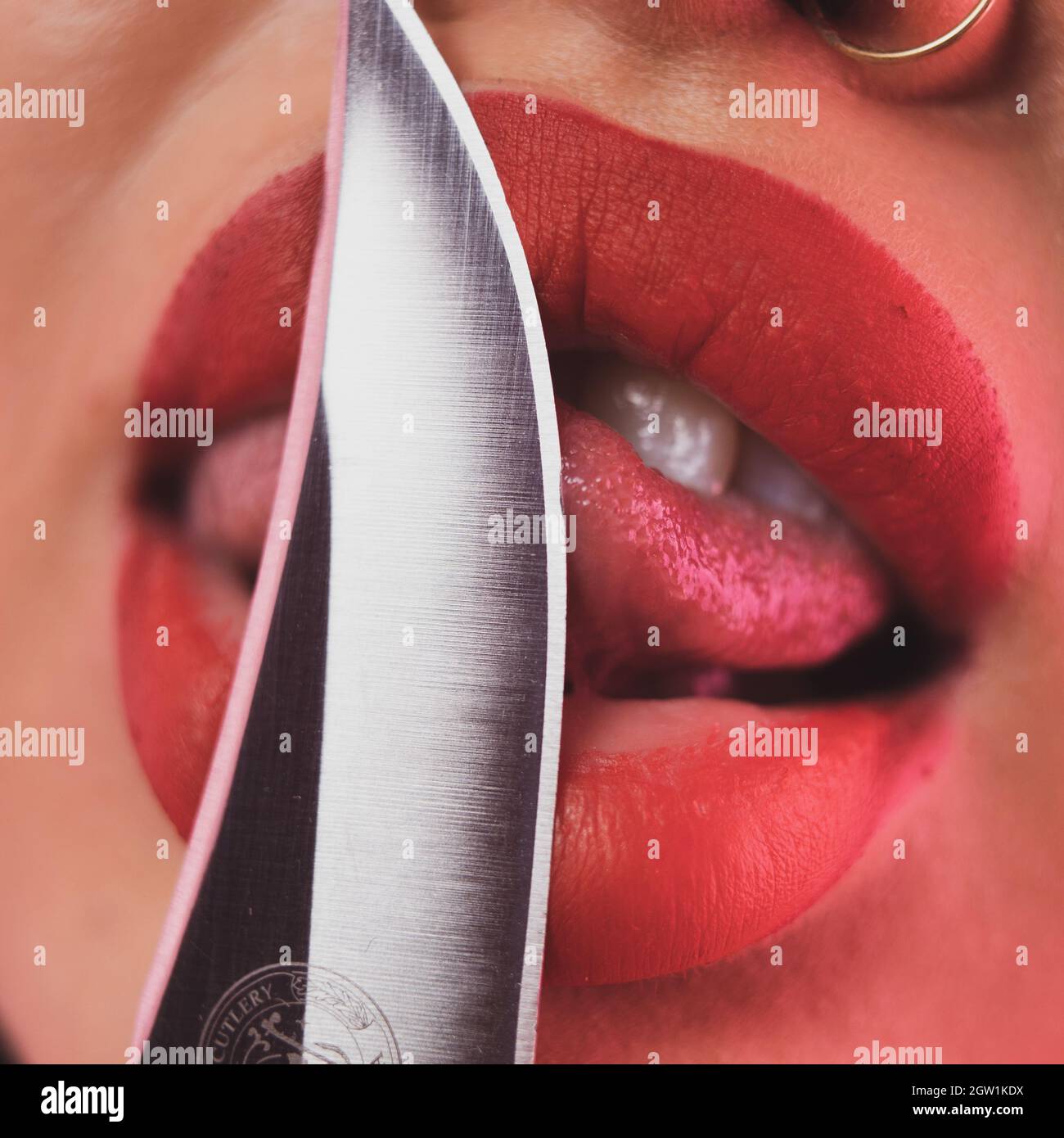 Licking Knife High Resolution Stock Photography and Images Alamy