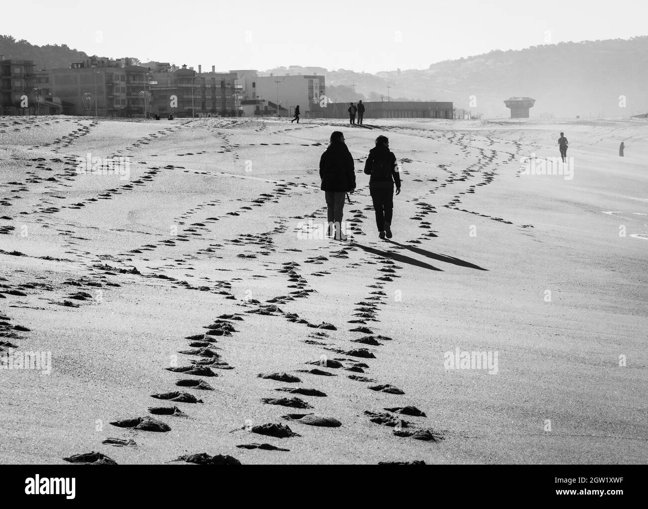 rear-view-of-two-women-walking-stock-photo-alamy