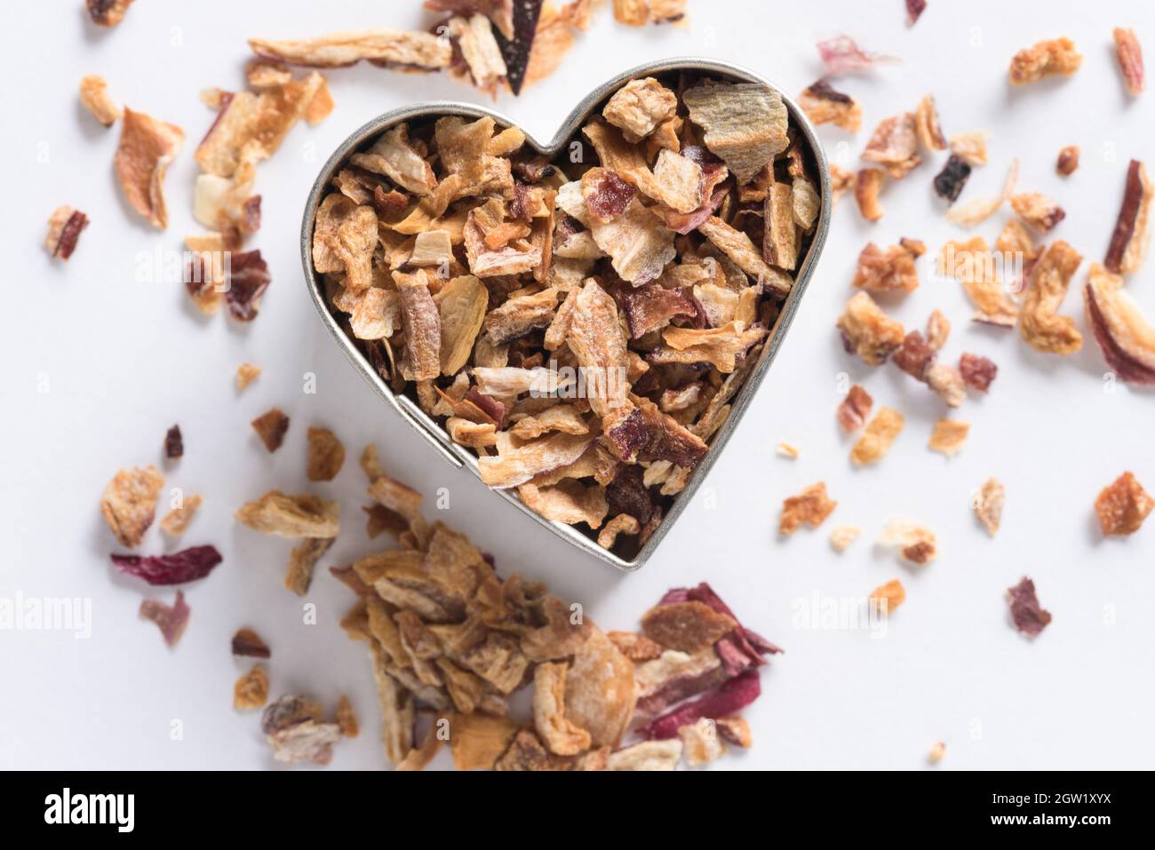 Dried Chopped Shallots In A Heart Shape Stock Photo