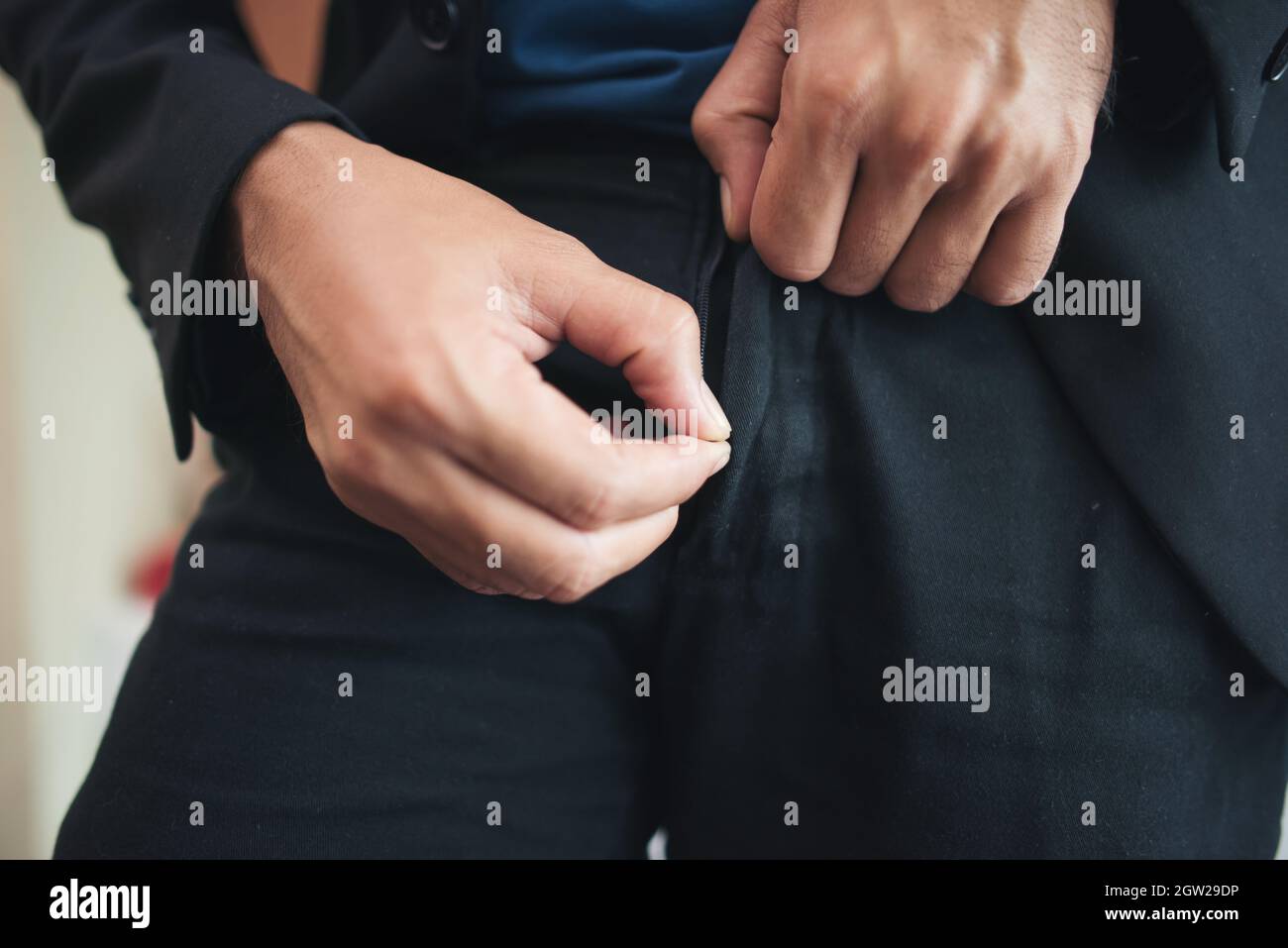 Pulling up pants hires stock photography and images Alamy
