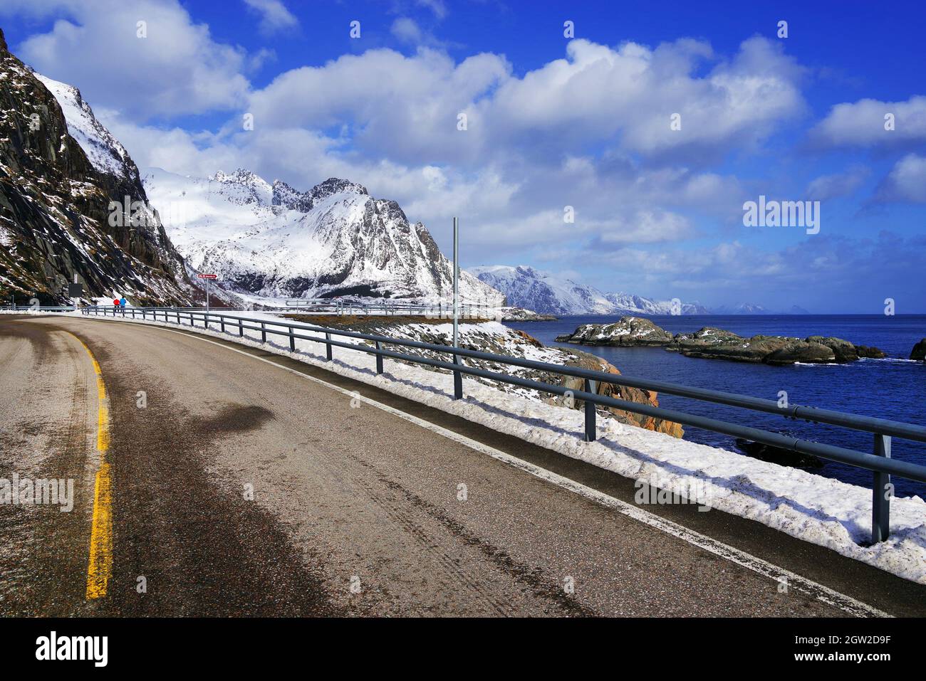 Road By Snowcapped Mountain Against Sky Stock Photo