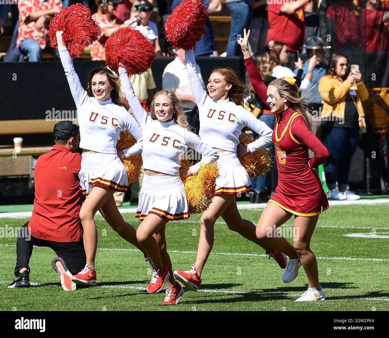 Boulder, CO, USA. 02nd Oct, 2021. USC cheerleaders run on the field before the football game between Colorado and USC at Folsom Field in Boulder, CO. Colorado lost 37-14. Derek Regensburger/CSM/Alamy Live News Stock Photo
