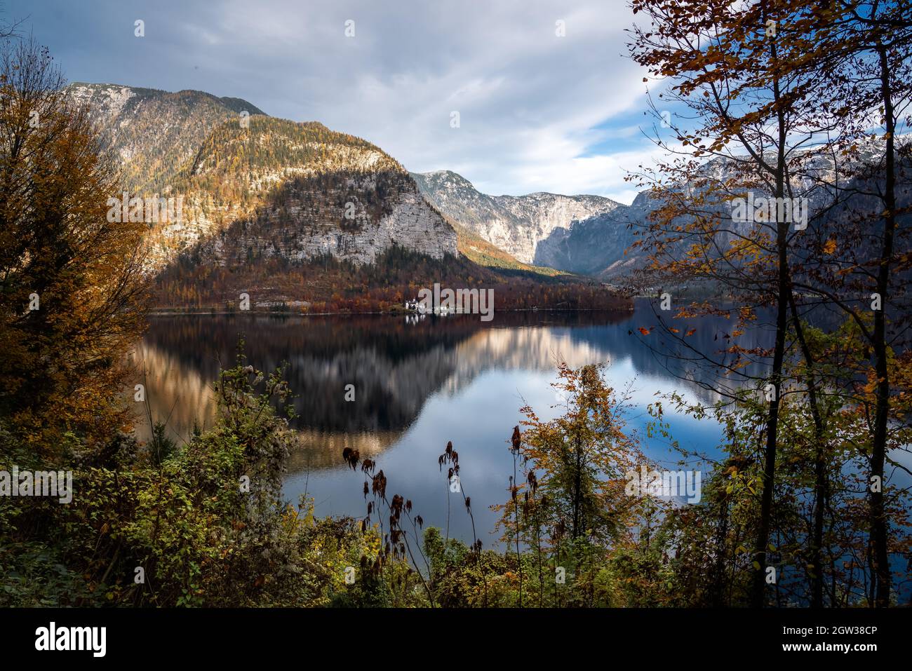 Autumn aerial view of Hallstatt Lake with Obertraun, Schloss Grub and Mountains - Hallstatt, Austria Stock Photo