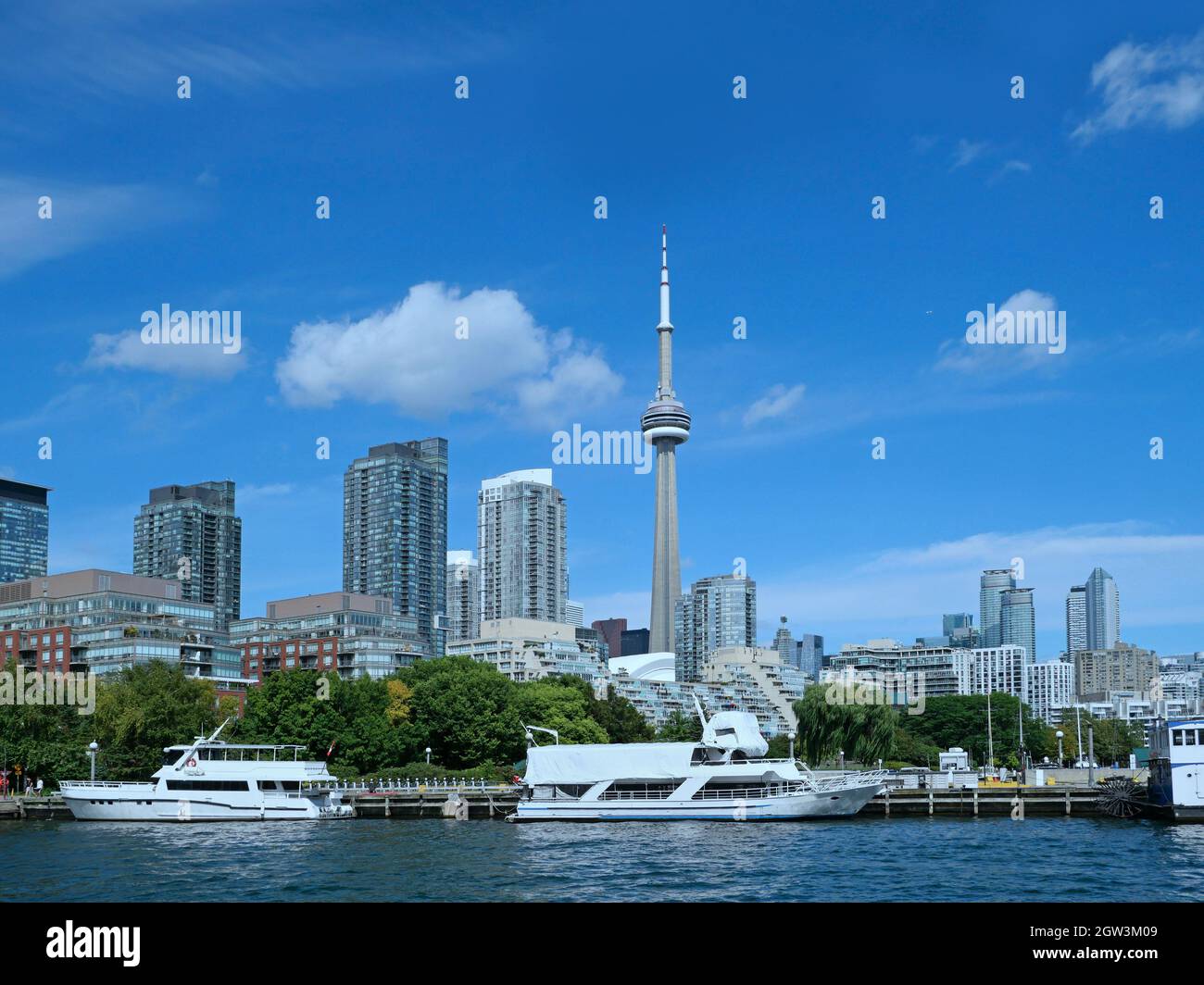 High rise apartment buildings and boating marinas line the Lake Ontario