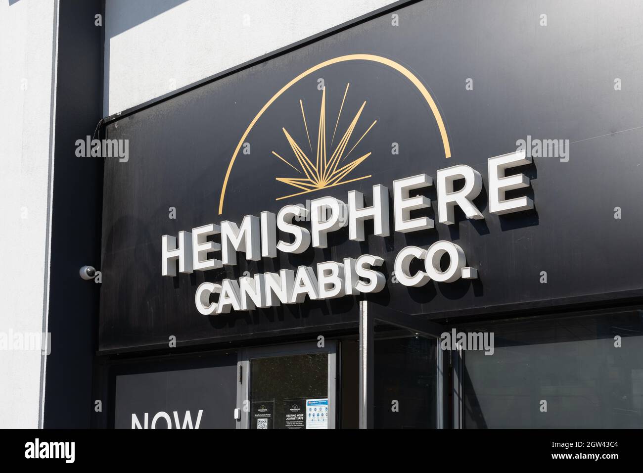 Toronto, Canada - October 2, 2021: Close up of Hemisphere Cannabis Co. store sign on King St W. in Toronto, Canada. Stock Photo