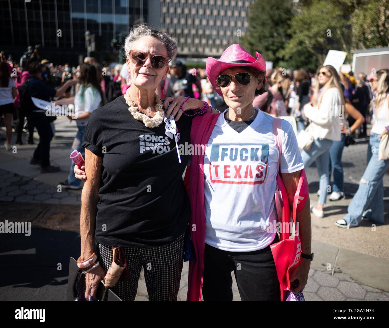 New York, New York, USA. 2nd Oct, 2021. ARDES QUINN, left, and ALLISON KLIEN right participate in the national women's march and rally at Foley Square in New York. Klein of New York, said 'she was out here to express here feeling of outrage for the audacity that the Republican Party is bringing to our country and into the world. Today specifically we are addressing the outlandish decision by the U.S Supreme Court not to interfere with the Texas ruling the fact that they are attempting to turn back women's rights, women's rights over their bodies, women's rights that should be med Stock Photo