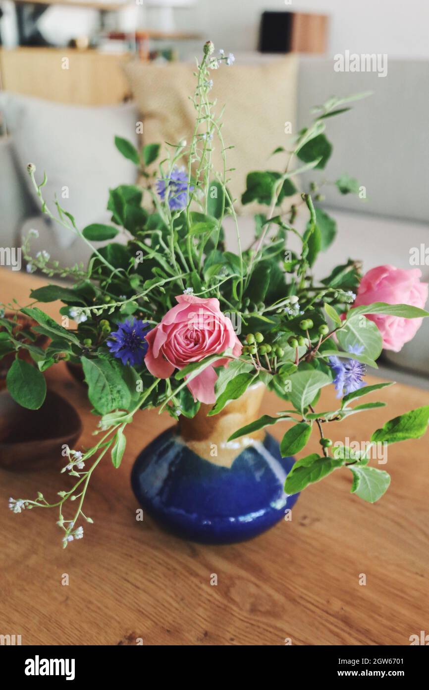 Flower Bouquet On Coffee Table Stock Photo - Alamy